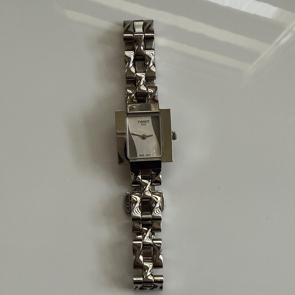 Tissot Silver Timepiece with Unique Bracelet